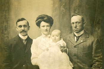 A 6-month-old Charlie Dyson in early 1910 with his parents (Lawrence, left, and Lillian) and an uncle.