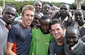 Seniors Andy Arnold and Will McFall with students at St. Patrick's School in Kenya.