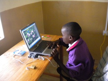 Student using laptop in Kenya