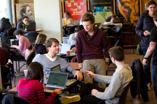 Students in the Amit Bhatia Libe Café in Olin Library