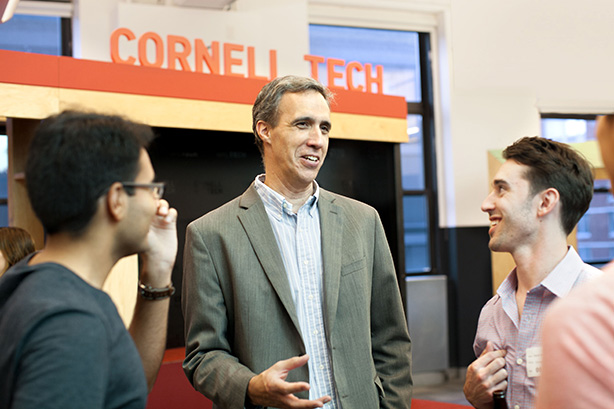 Dan Huttenlocher mingles with students at financial engineering mixer