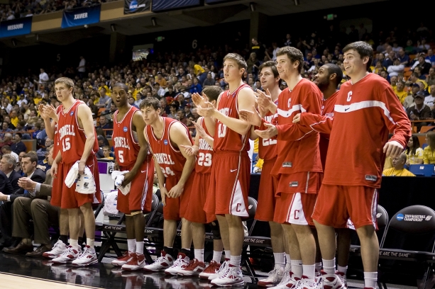 Cornell basketball team on the sidelines