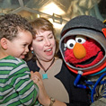 Margaret Weitekamp with son and Elmo