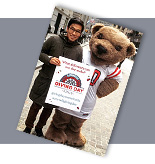 alumnus with Big Red Bear