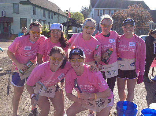 Women's ice hockey team members at Women Build Weekend for Habitat for Humanity