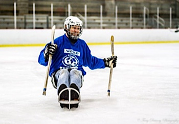 David Crandell on hockey sled