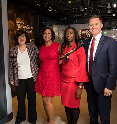 President Martha E. Pollack, Katrina James, Laura Wilkinson and Terry Horner visit the Cornell banner at the National Museum of African American History and Culture in Washington, D.C.