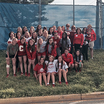 Cornell Field Hockey Association members with current Big Red field hockey players
