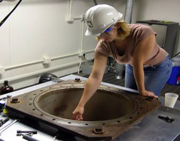 Jennifer Hanley conducts experiments in Mars simulation chamber