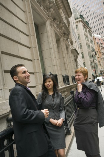 Victoria Averbukh with students Raymond DiFelice and Di Li in the financial district