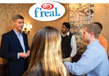 Jim Farrell, CALS '78, founder of F'real, talks with students.