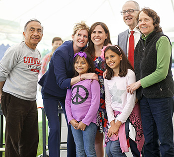 Robin Davisson and David Skorton meet with families after a Cornell Commencement