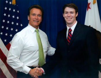 Junior football player Doug Dolan with California Gov. Arnold Schwarzenegger