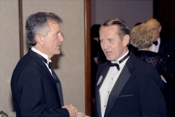 Chuck Feeney with then-dean of the School of Hotel Administration Jack Clark in 1989