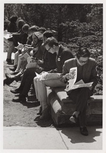 Students reading The Cornell Daily Sun