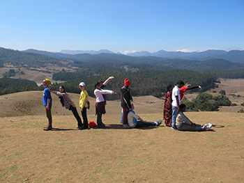 Cornell and community member students in the Toda grasslands of the Nilgiri Biosphere Reserve
