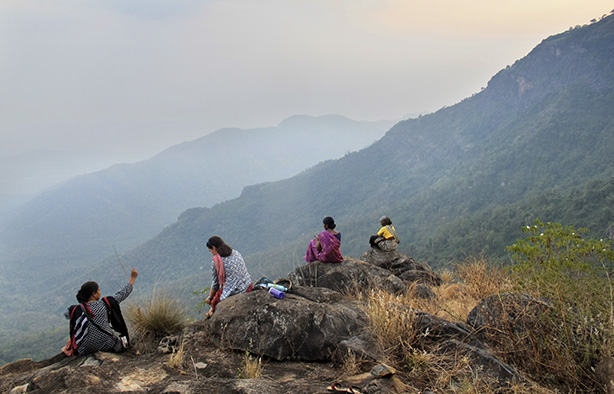 Keystone Foundation staffer and Nilgiris Field Learning Center students look out over the hills in Tamil Nadu, southern India