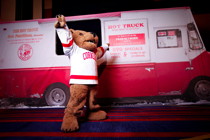 Big Red Bear in front of Hot Truck mockup at Cornell Alumni Leadership Conference in Washington, D.C.