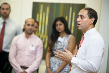Johnson Dean Soumitra Dutta chats with returning MBA students