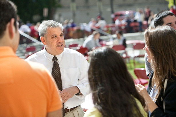 Human Ecology Dean Alan Mathios with students during Commencement Weekend