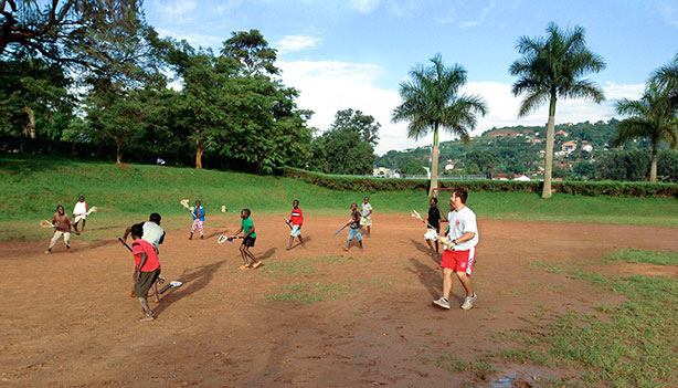 Rob Pannell plays lacrosse with students in Uganda