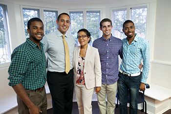 City of Ithaca Mayor Svante Myrick '09, second from left, meets with students and Associate Dean of Students Renee Alexander, center, director of intercultural programs, at 626 Thurston, the Cornell Center for Intercultural Dialogue.