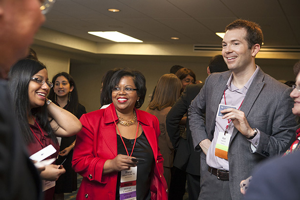 Sheryl Tucker '78, center, alumni-elected Cornell trustee and chair of Cornell Mosaic, chats with participants at the 2013 Cornell Alumni Leadership Conference in Boston.