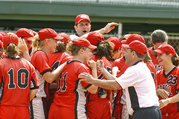 softball coach Dick Blood with the team at the 2004 NCAA regionals