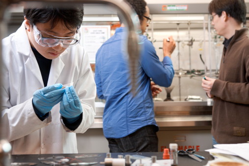 Students in lab with assistant professor Richard Robinson