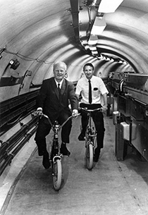 Hans Bethe and Boyce McDaniel in underground electron storage ring tunnel