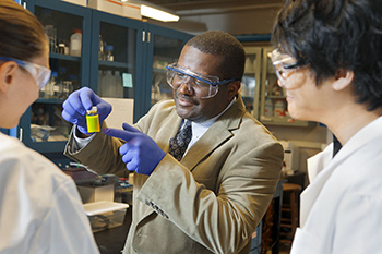 Lynden Archer, professor and director of the School of Chemical and Biomolecular Engineering, in his lab with students