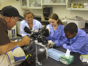 Hekia Bodwitch  '09, left, in a human ecology lab