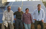 Professor and student with solar array in Belize