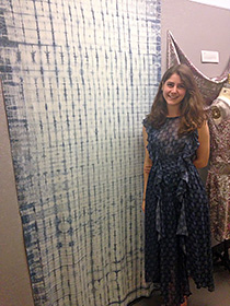 Daniela Cueva shows her final project for textiles course