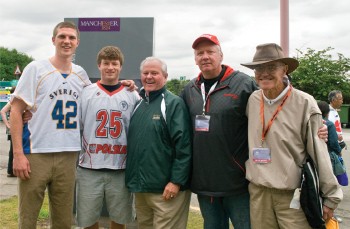 Jernudd and Kamedulski pose with former Big Red lacrosse coach Richie Moran, Mike French '76 and John Phillips '58