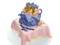 Teapot-themed birthday cake