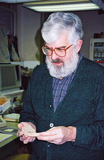 Patrick McGovern with jar shard sample in laboratory